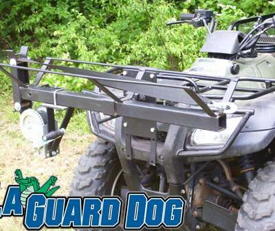 A black four wheeler with the words guard dog.