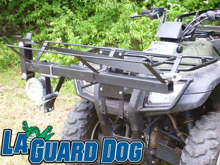A black four wheeler with the words guard dog.